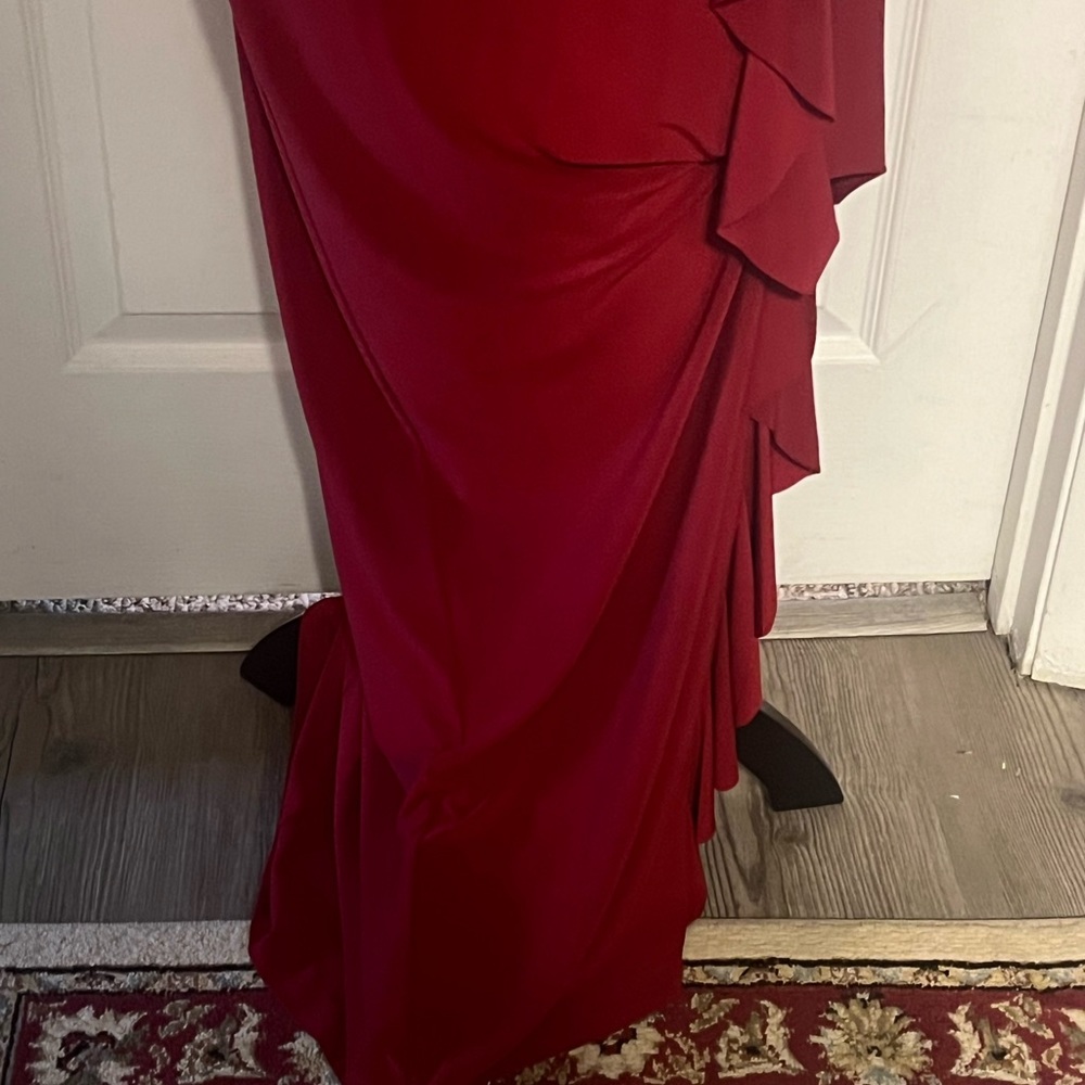 Lauren, deep red dress. Stretch knit with side ruffle open to knee.